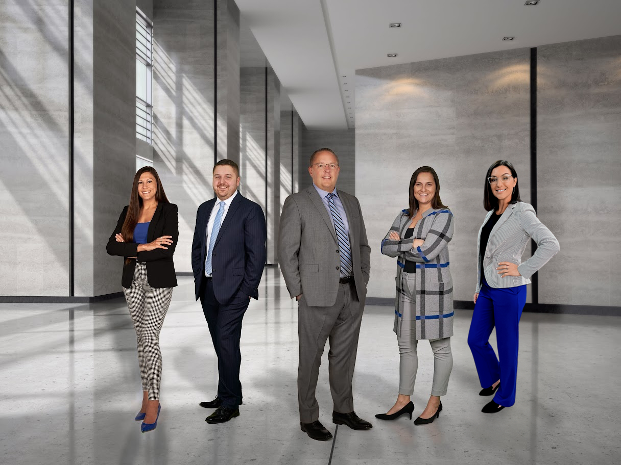 Image of the tim hillmer team. 5 total people. From left to right Kendra Fenner, Matt Hillmer, Tim Hillmer, Jackie Cone, Michelle Heizlinger